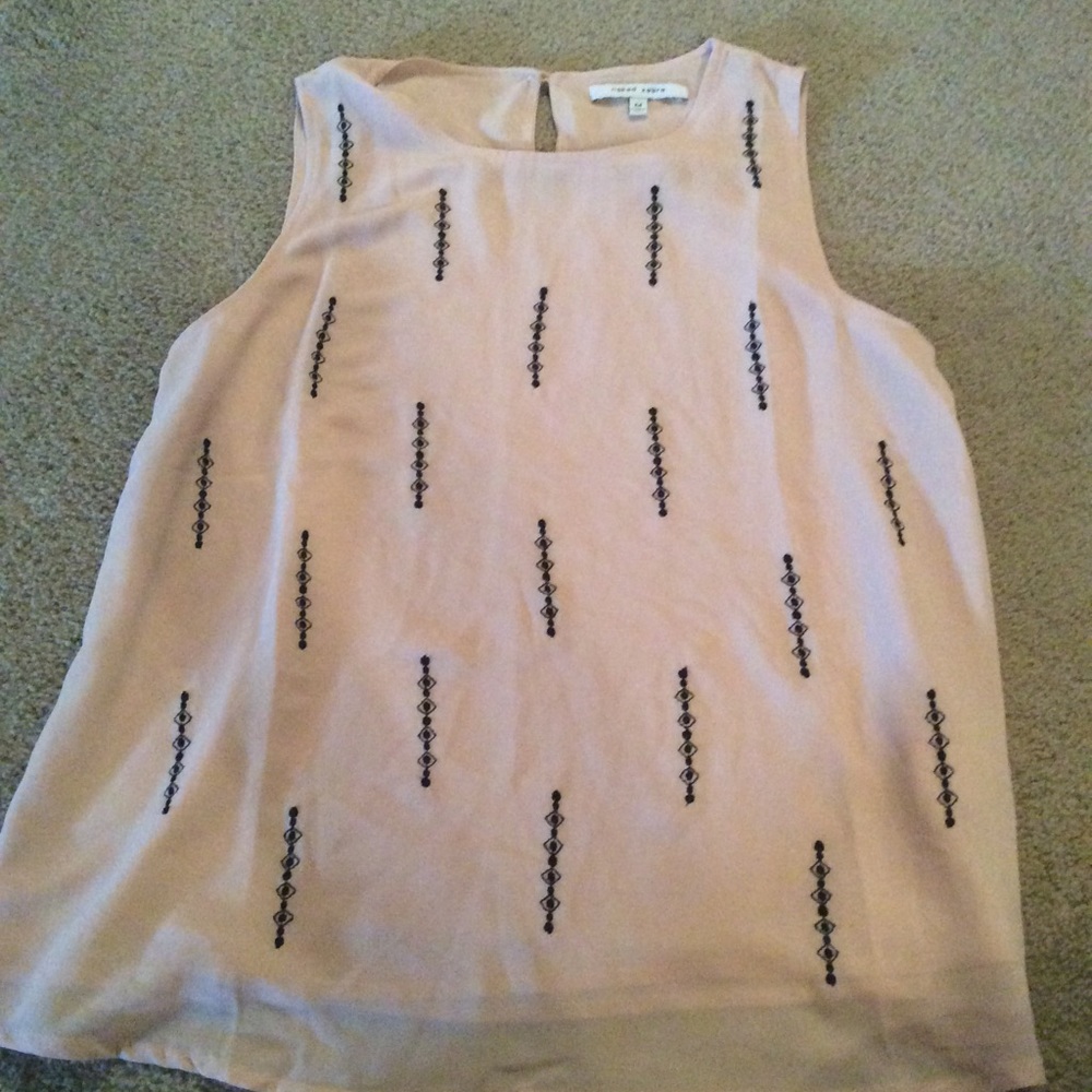 Beautiful simple top to go with any bottoms.